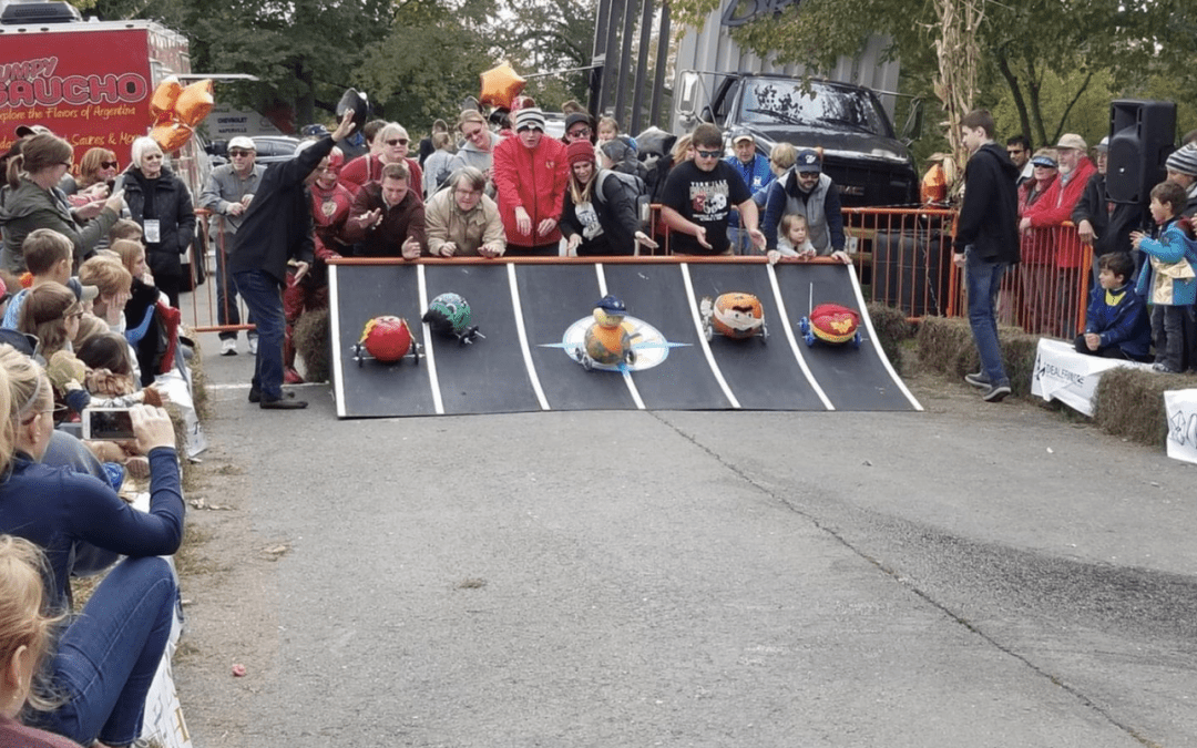 Fast-moving Pumpkins Roll Downhill in Annual Naperville Race
